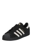 ADIDAS ORIGINALS Matalavartiset tennarit 'Superstar'  kulta / musta / ...