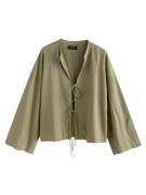 Next Pusero  khaki