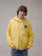 Tommy Jeans Collegetakki  keltainen