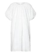 Dress .-- Pompi White Mango