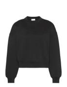 A- Logo Emb French Terry Crewnec Black Calvin Klein
