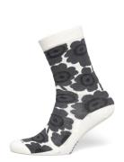 Linjaus Unikko Black Marimekko