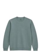 Johannes Crewneck Garment Dyed Blue A QUESTION OF