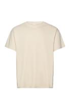 Sddanton Ss Tops T-shirts Short-sleeved Cream Solid