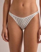 Calvin Klein Underwear - Valkoinen - String Thong (Dipped)